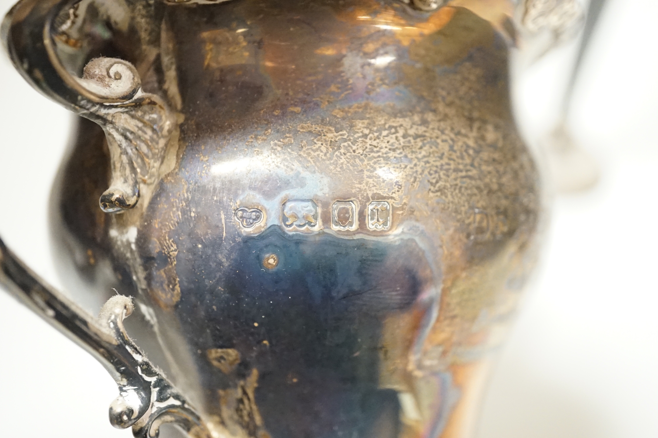 A George V silver two handled vase, Goldsmiths & Silversmiths Co Ltd, London, 1932, 16.2cm, 10oz and a spill vase.